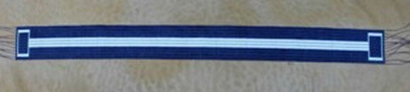 The Friendship Belt is a Alliance Agreement between Anishinabek and Haudenasaunee, Two Squares represent the two Confederacy's and the white line between is the path of Peace and Friendship. This is to believed to be created long before the 1600's war between Anishinabek and Haudenasaunee at a time when Anishinabek begain their migration from the East Coast and came across the 5 Nations people