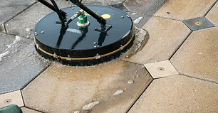 Close up Pressure Washing Driveway Surface Cleaning.jpg