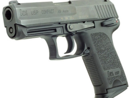 A convicted felon points a gun at a passing vehicle