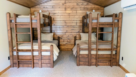 Custom bunk beds make out of knotty alder with a custom stain color