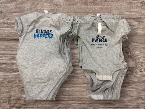 Two gray, short-sleeved baby onesies with custom black logos: one reading "Future PLUMBER" and the other "PWTech."