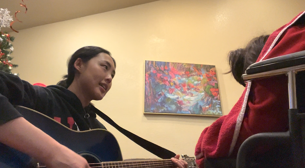 Music therapy with guitar and singing