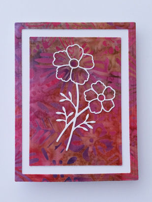 Handcrafted 4⅛" X 5⅜" all occasion greeting card featuring a simple white bouquet outline on a soft mauvy pink batik fabric background with a matching background frame. Card is blank inside and includes a white envelope.
