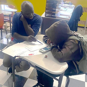 mentor Bobby Ondago with student