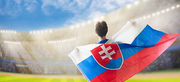 Slovakia football supporter on stadium. Slovak fans on soccer pitch watching team play. Gr