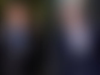 TWO TRUMP AIDES CHARGED IN RUSSIA PROBE