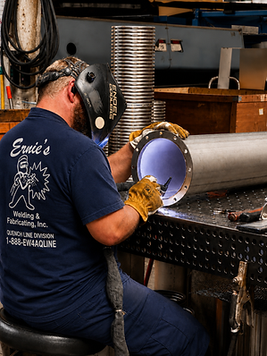 Custom welded stainless steel MRI quench vent system