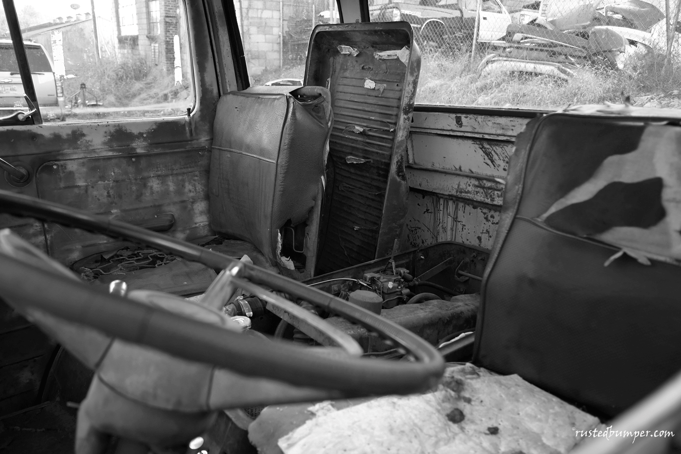 1962-Ford-Econoline-5-Window-Driver-Engine-Interior-BW.gif