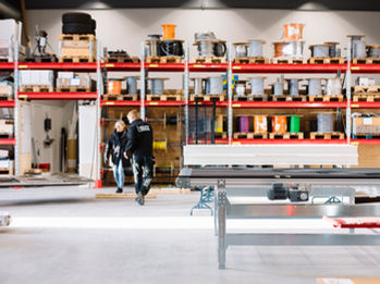 Workshop, electrical cables, boxes, and pallet racks