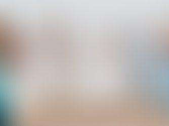 Couple surrounded by friends on Lusty Glaze Beach