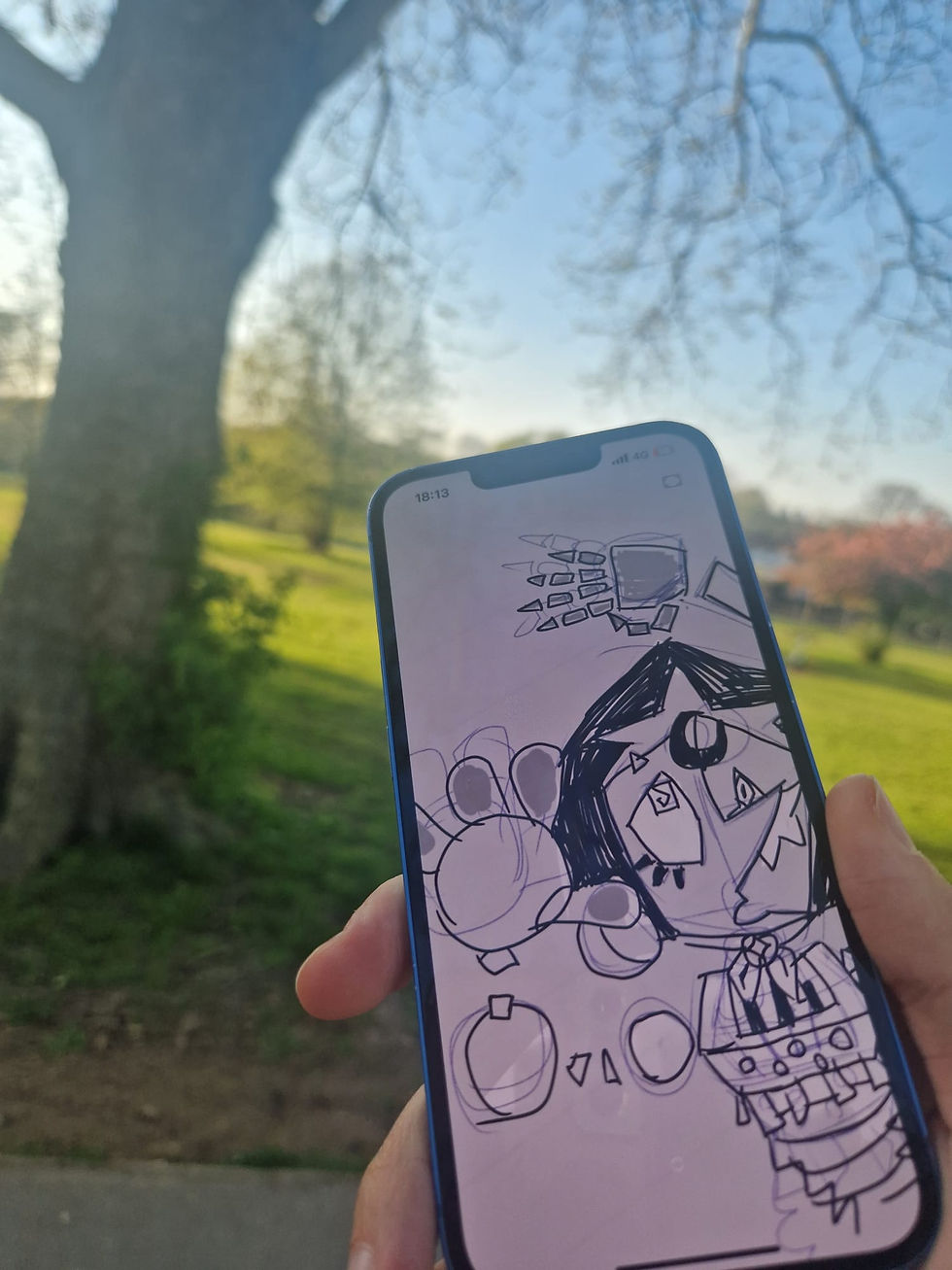 Photo of MoonShine trapped in the confines of my smartphone, not being able to play in the lush green fields and soiled foliage.
