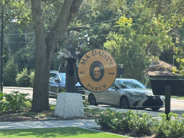 Image of the sign in front of Ma Daisy's Porch.