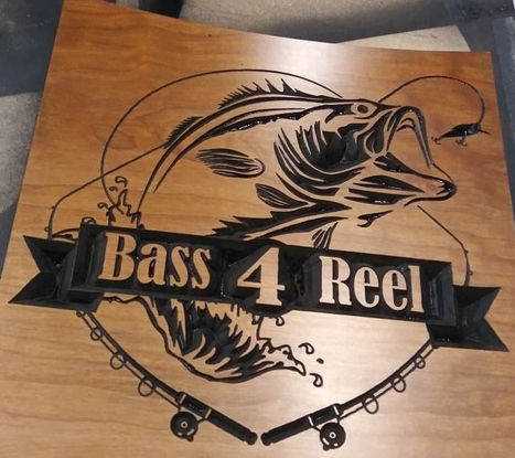a wooden sign that says bass 4 reel on it