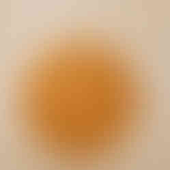 a wooden plate with a circular design on it