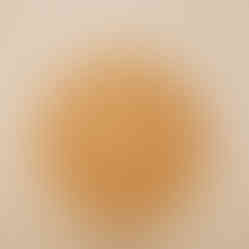 a round piece of wood with a circular design on it