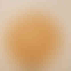 a wooden plate with a circular design on it