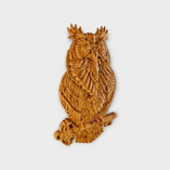 Detailed birch wood carving of owl holding key perched on branch wall art