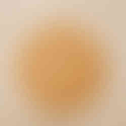 a wooden plate with a circular design on it