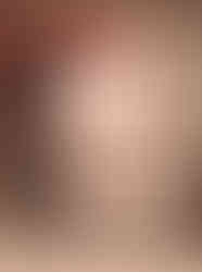 a drawing of a hand holding a flower next to a vase of flowers .