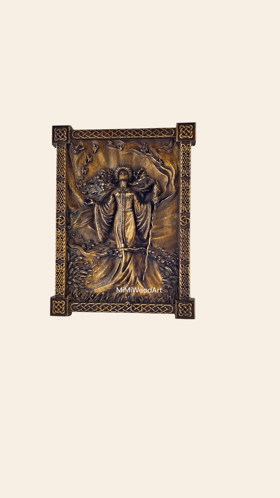 Handcrafted ash wood wall carving of a Celtic goddess holding a torch beneath ancient trees