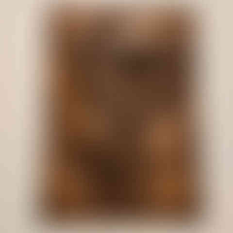 a wood carving of a dragon and a woman with wings