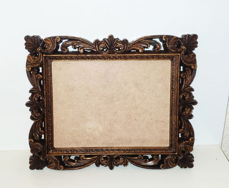 a picture frame with a fancy design on it