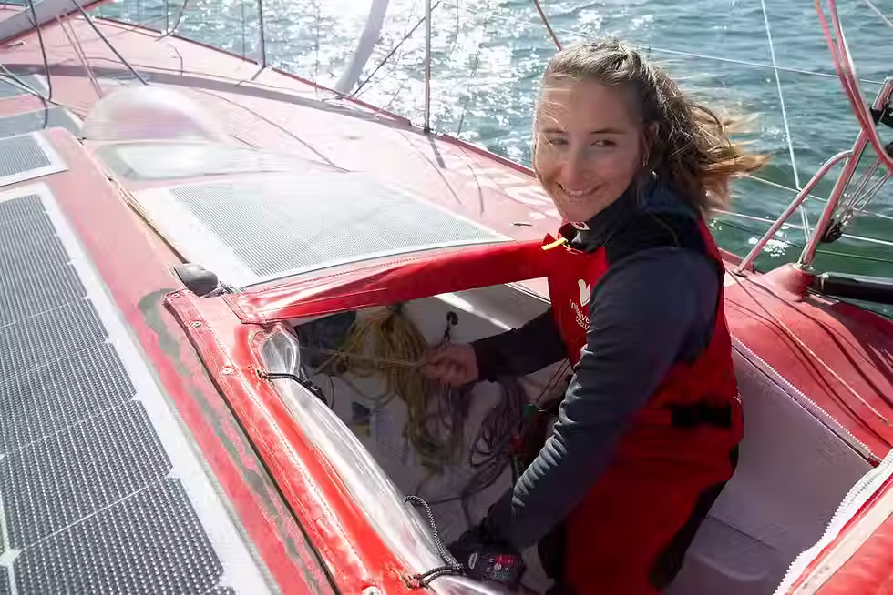 Violette Dorange at the helm of her IMOCA Initiatives Coeurs
