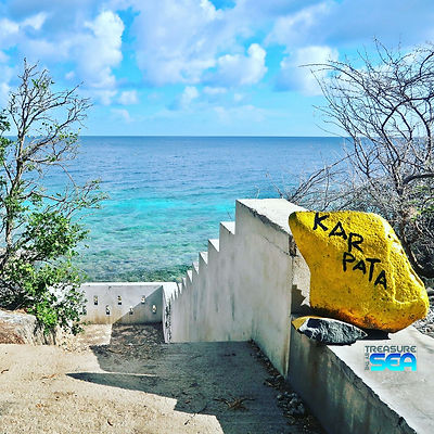 KARPTA DIVE SITE MARKED WITH YELLOW PAINTED ROCK