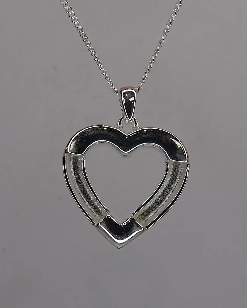 Equestrian heart pendant
