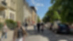 The MAXX Hotel Sanssouci (at center) and the lively street with cafes and other nearby hotels.