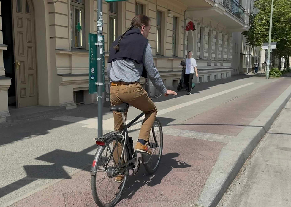 A 'cycle track" next to a sidewalk in Potsdam. Bike lanes added to street lanes can be dangerous, effectively widening the street and encouraging speeding.  