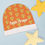 Thumbnail: Faith Armor Apricot Monogram Armor Shields Baby Beanie ©