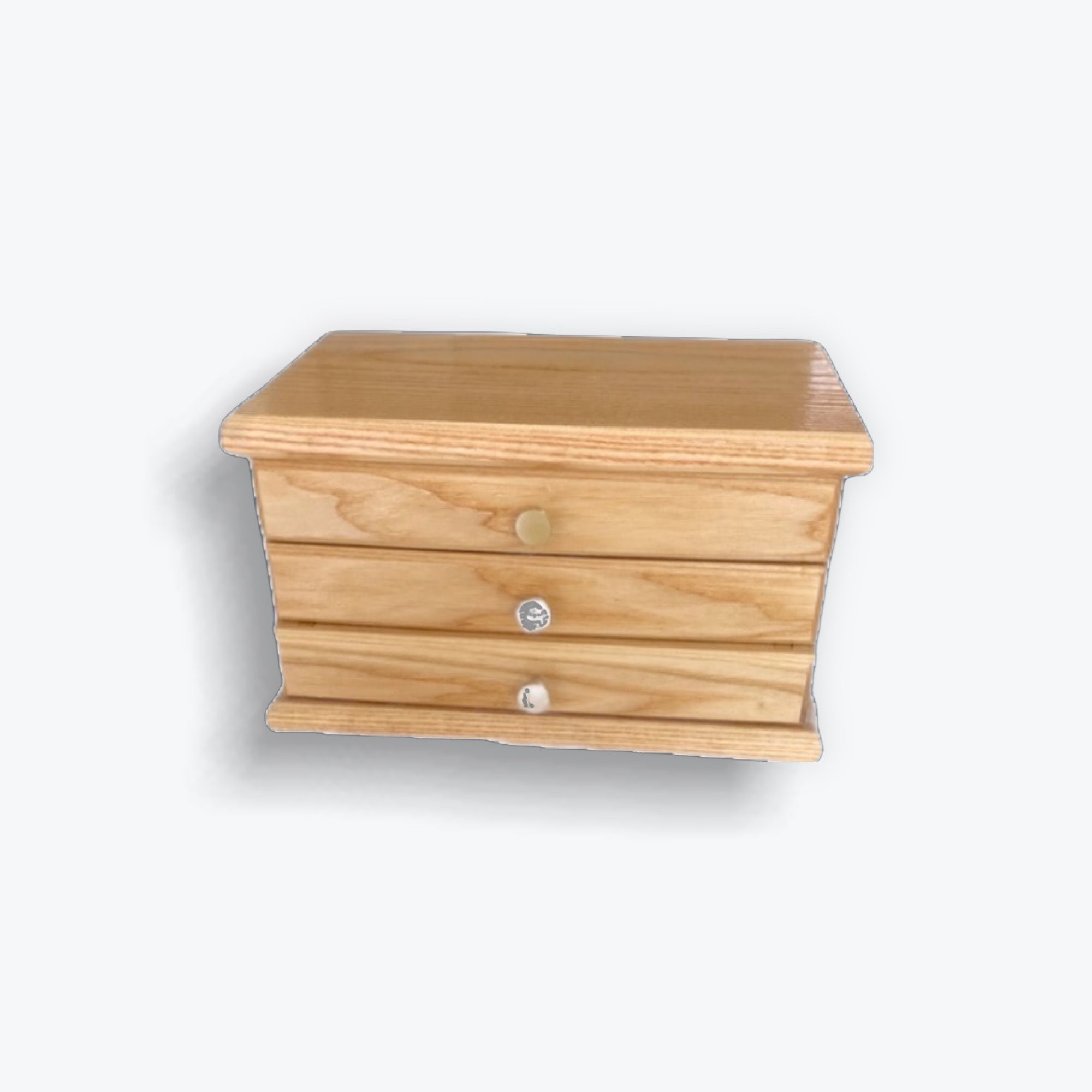 Tall wooden jewelly bow with three drawer.