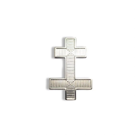 A silver coloured metal patriarcha cap cross