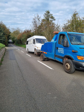 Broken down minivan being recovered by Pegasus Vehicle Recovery, Isle of Jersey, UK