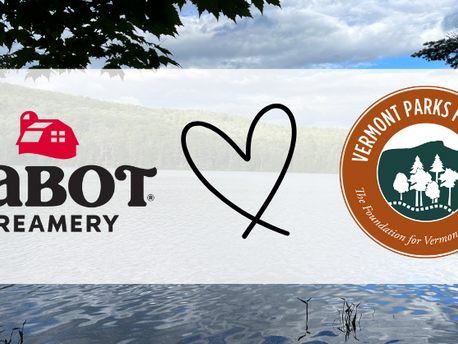 Cabot Creamery logo, a hand drawn heart, and the VPF logo on top of a photo of a lake