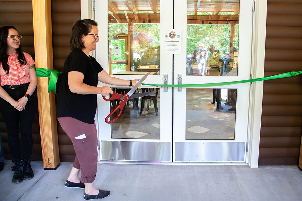 Julie Moore, Secretary of the Vermont Agency of Natural Resources, cuts the opening day ribbon.