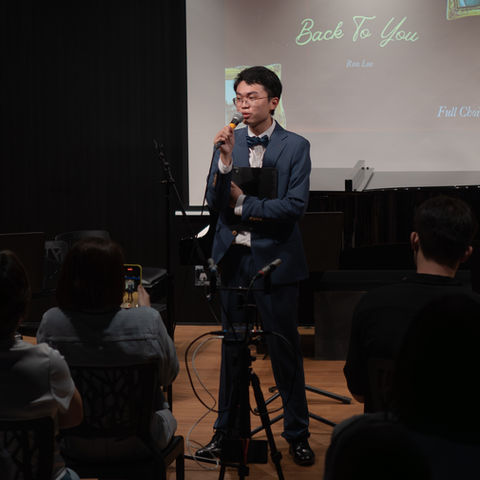 Ron gives a speech to an audience at his concert this June. He reflects on his journey. 