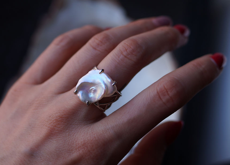 Wide ring with Baroque pearl