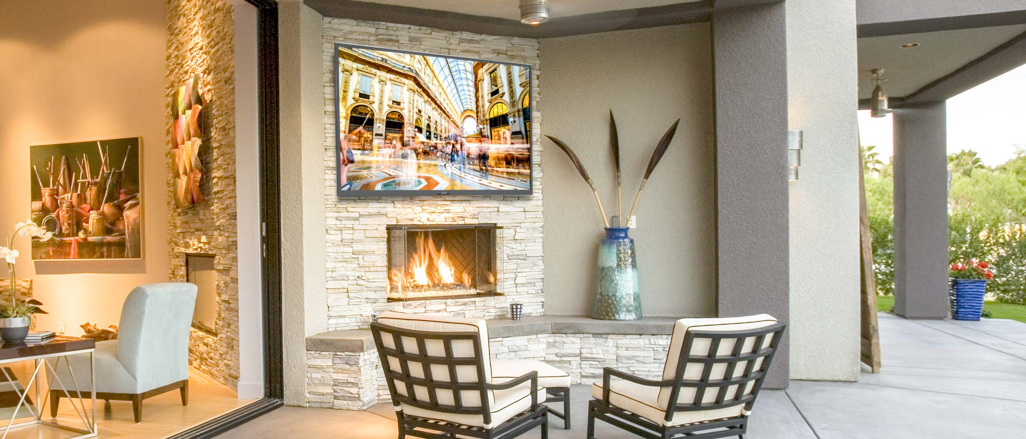 Patio space with an outdoor rated Sunbrite TV