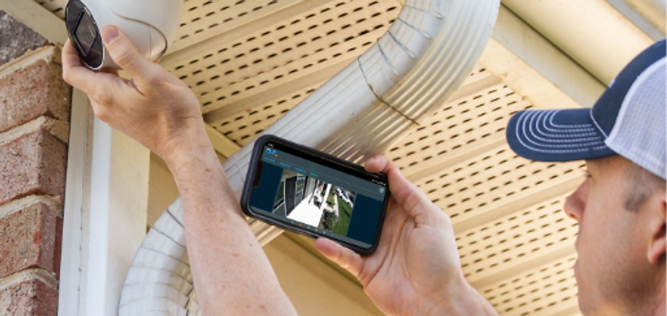 Photo of an installer configuring an IP security camera