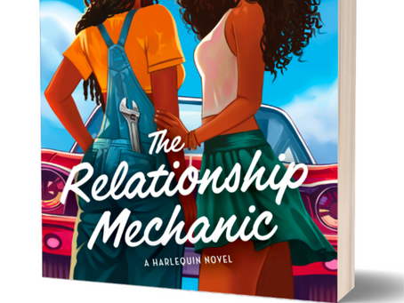 The Relationship Mechanic cover. Two women gazing into one another's eyes. They are standing in front of a red car.