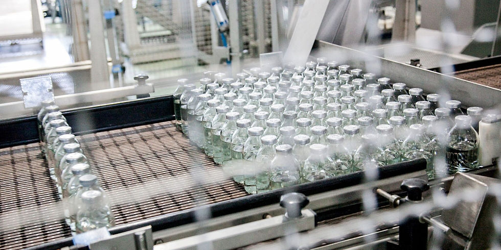 pharmaceutical vials on wire belt