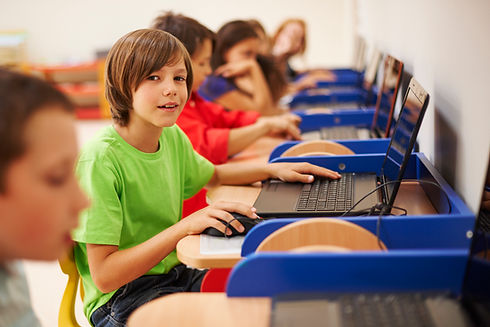 pupils-sitting-computer-science-lesson.jpg
