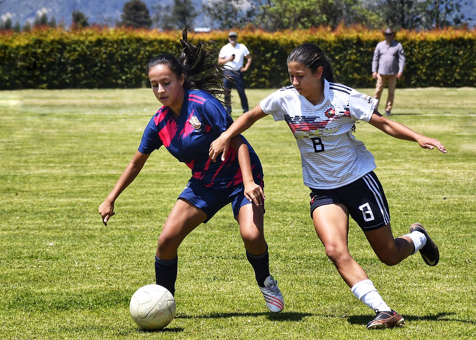 Women playing soccer