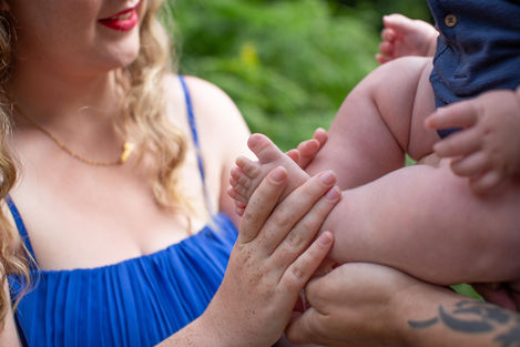 mum holds son's tiny feet