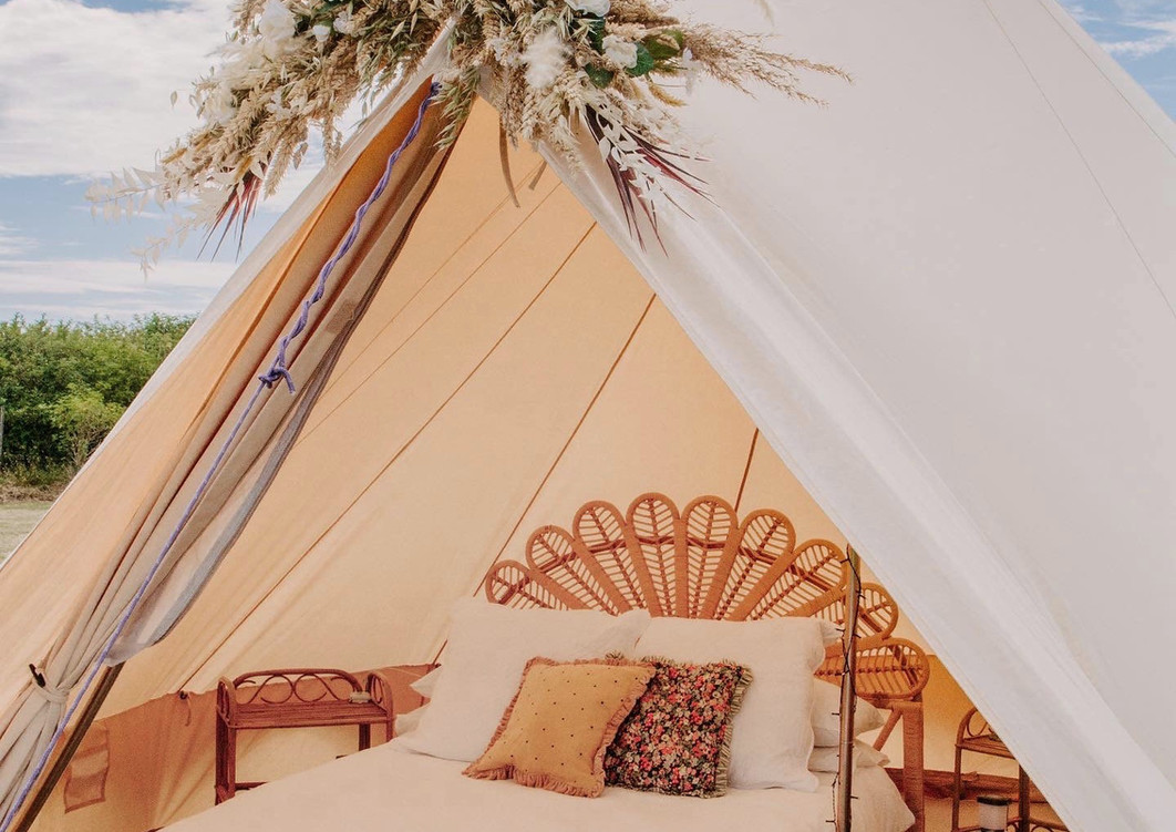 trendy bell tent interior with dried flowers