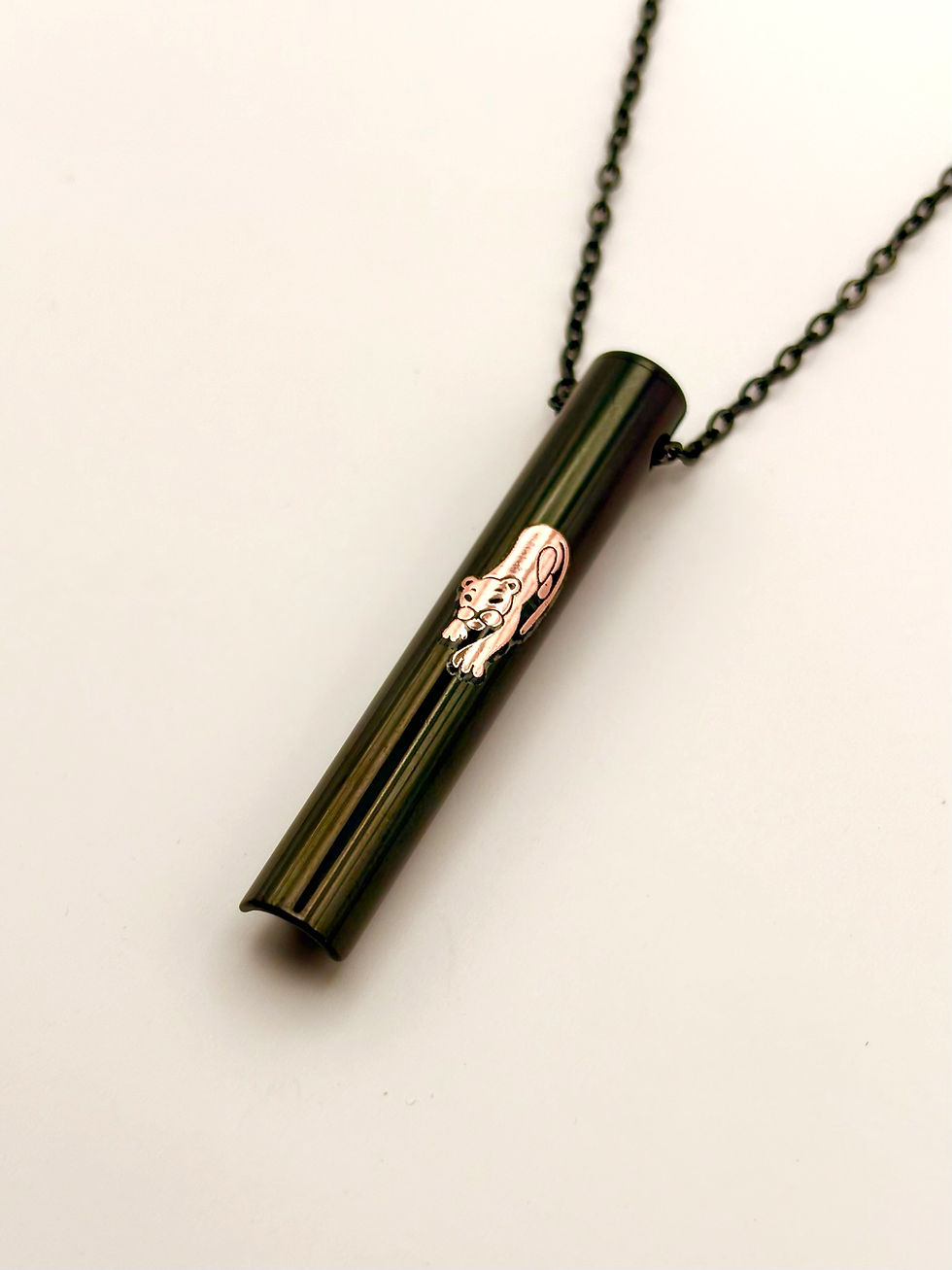 black zinc stop smoking chalumu breathwork necklace with rose-gold panther design