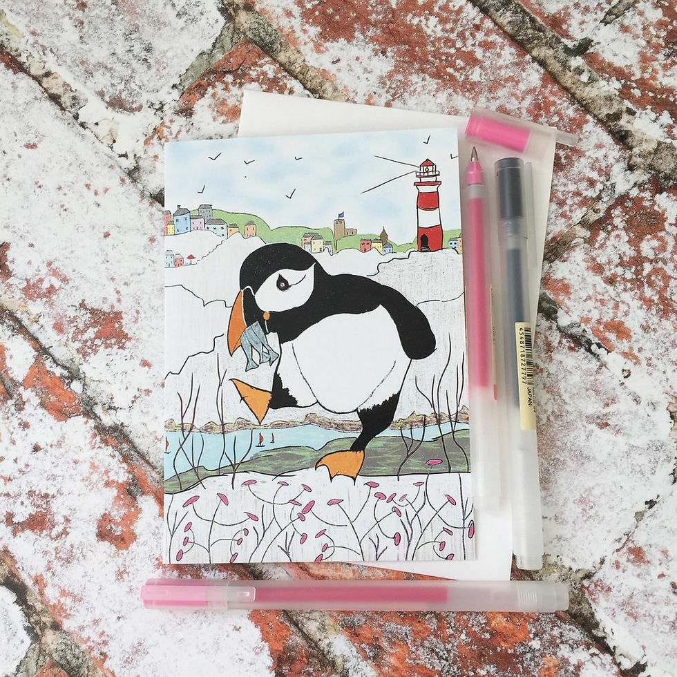 This card is inspired by my friend's love of puffins and my childhood visits to the British seaside.