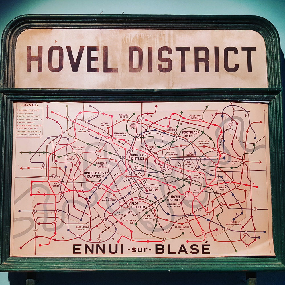 A fictional 'Ennui-sur-Blasé' metro map prop from The French Dispatch, labelled 'Hovel District'.